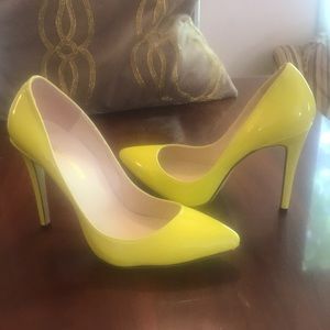 Bright yellow pumps